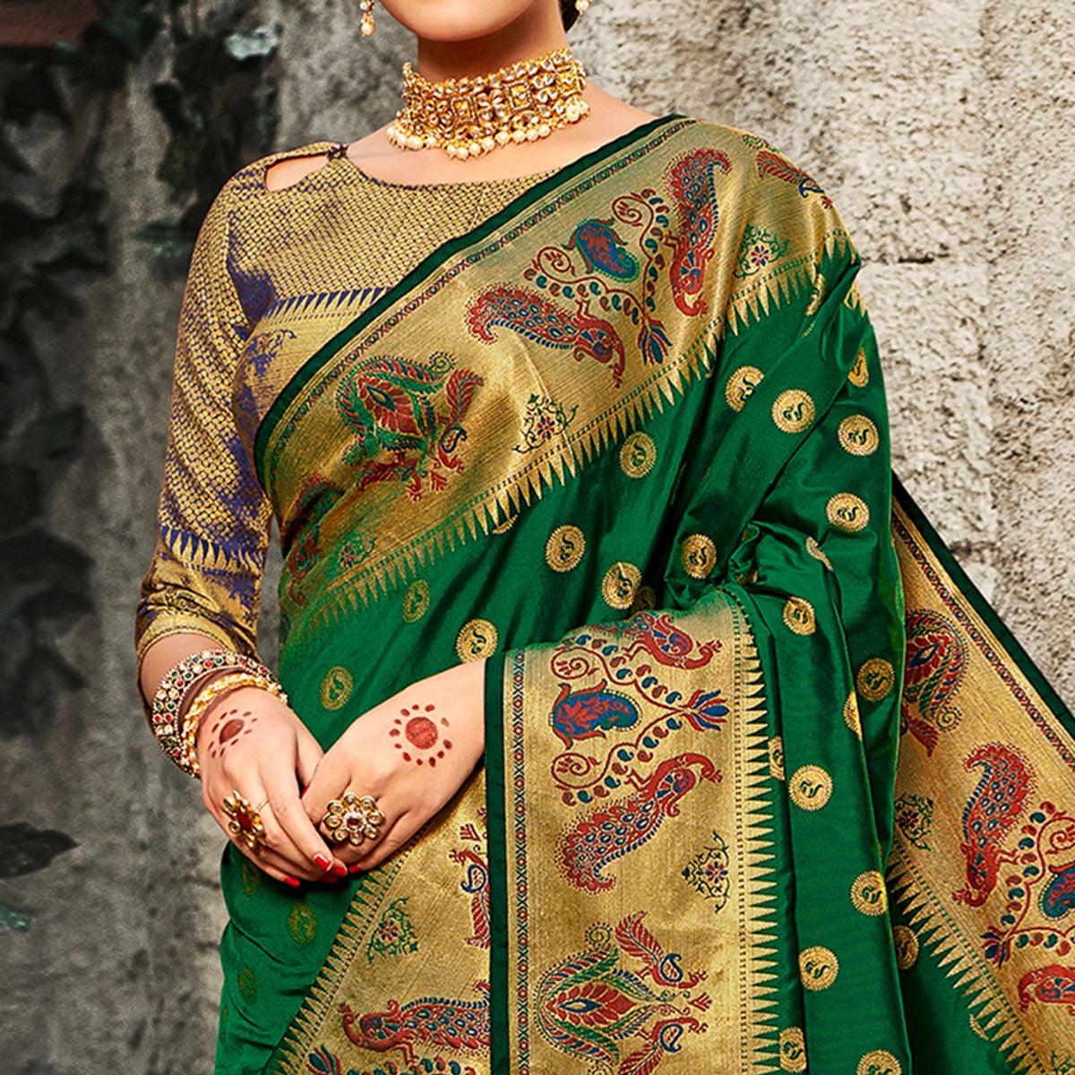 Arresting Green Colored Festive Wear Woven Banarasi Silk Saree With Tassels - Peachmode