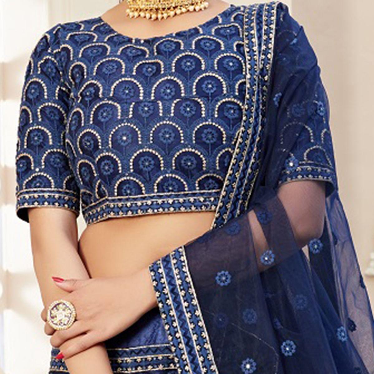 Arresting Navy Blue Coloured Thread Embroidery Heavy Net Lehenga Choli - Peachmode