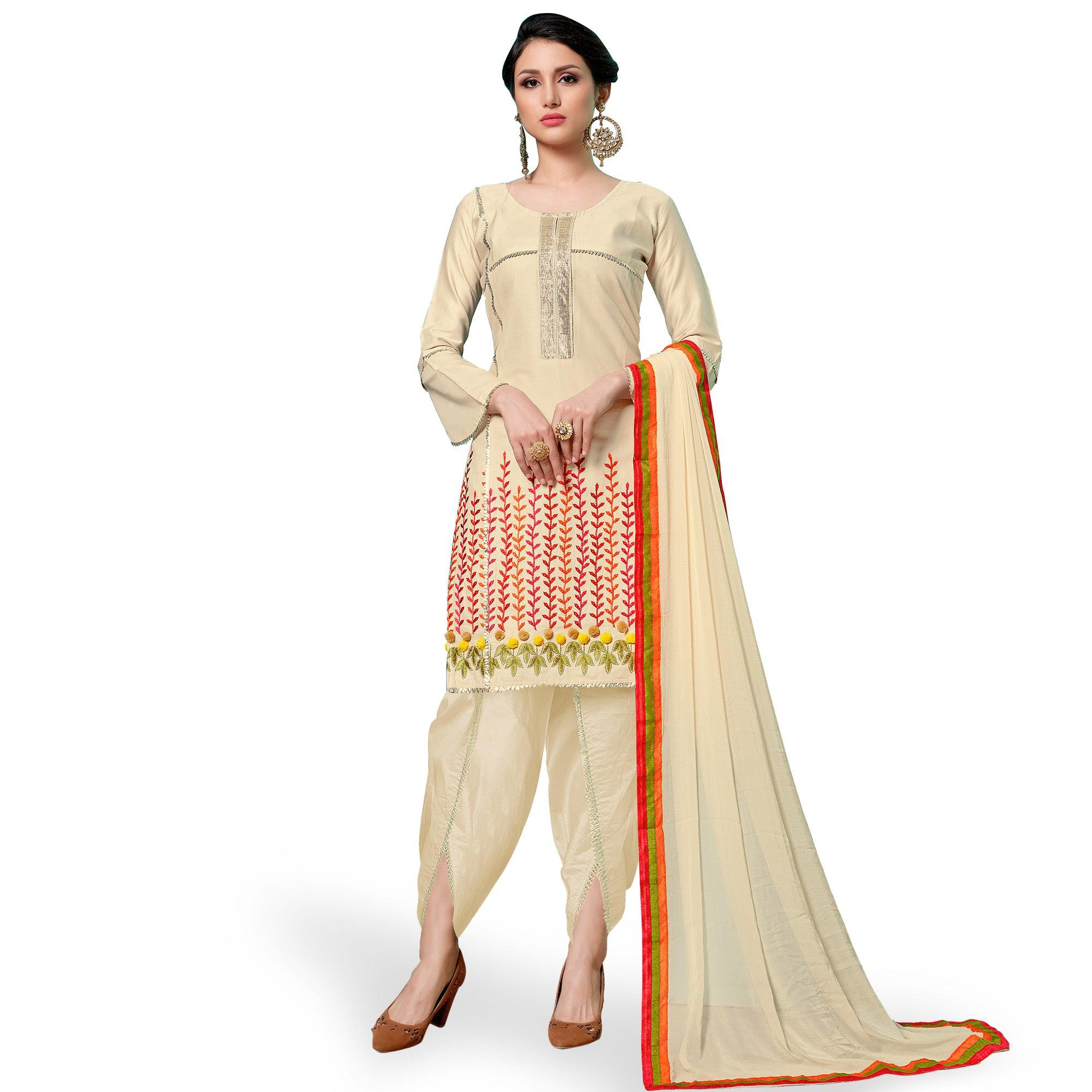 Attractive Cream Colored Partywear Embroidered Cotton Dress Material - Peachmode