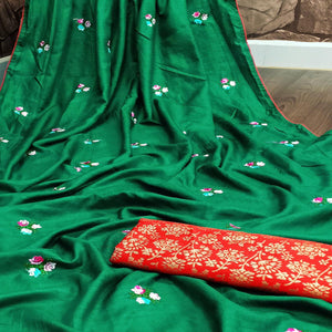 Attractive Dark Green Colored Partywear Embroidered Dola Silk Saree - Peachmode