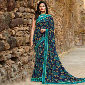 Attractive Navy Blue Colored Casual Floral Printed Georgette Saree - Peachmode