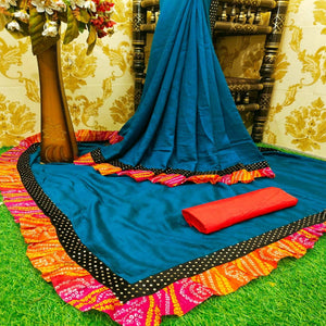 Beautiful Rama Colored Partywear Solid Vichitra Silk Saree With Bandhani Print Ruffle - Peachmode