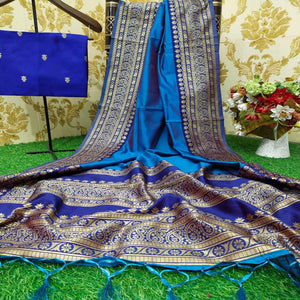 Beautiful Turquoise Blue Colored Festive Wear Woven Soft Lichi Silk Saree - Peachmode