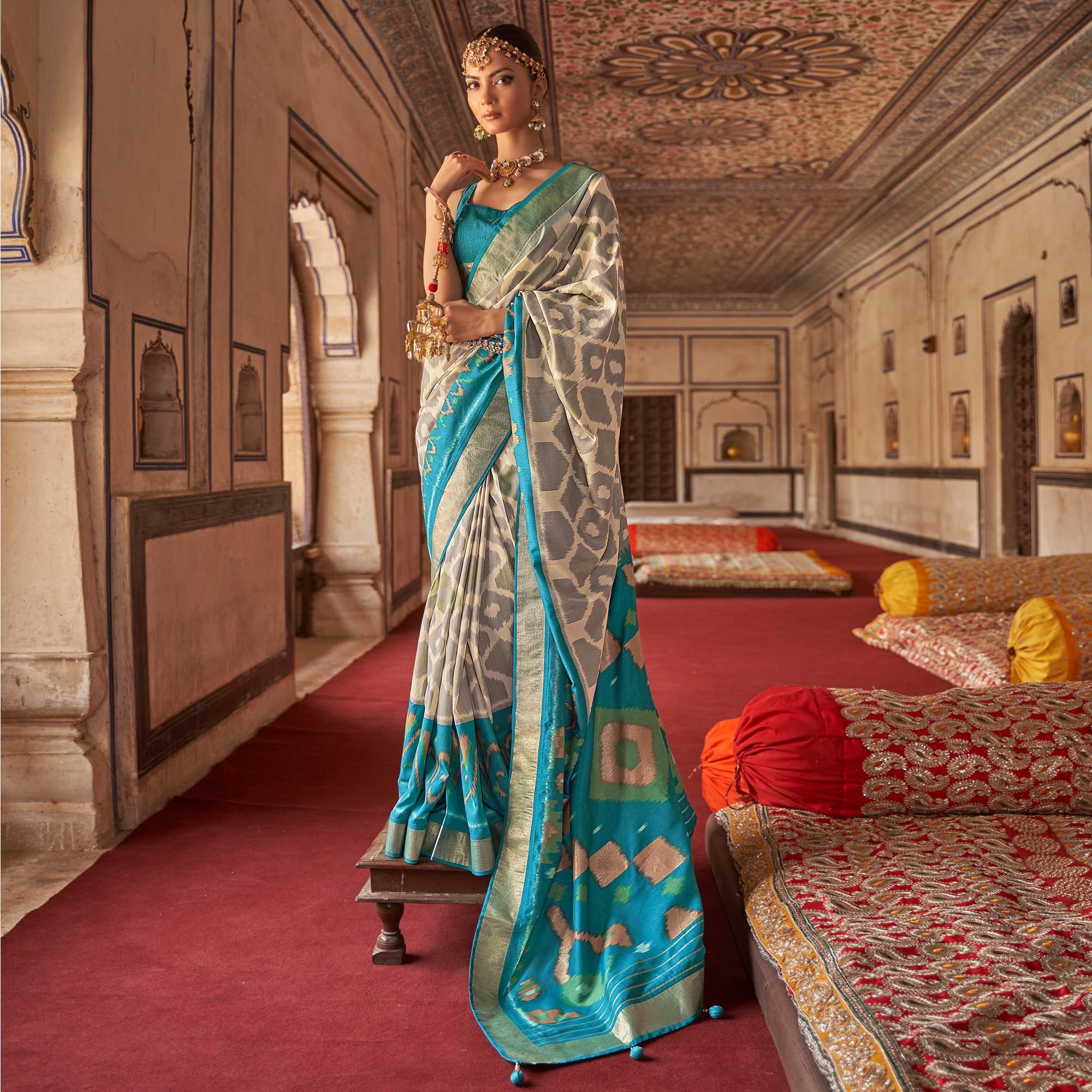 Beige & Light Blue Ikkat Printed-Woven Patola Art Silk Saree - Peachmode