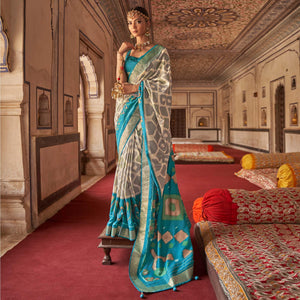 Beige & Light Blue Ikkat Printed-Woven Patola Art Silk Saree - Peachmode