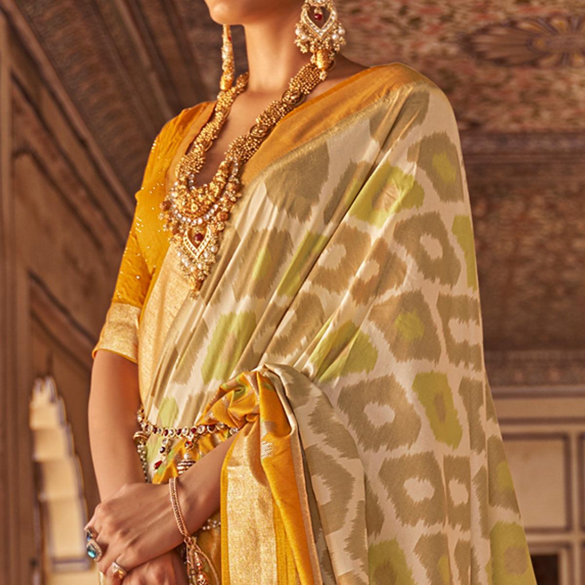 Beige & Mustard Ikkat Printed-Woven Patola Art Silk Saree - Peachmode