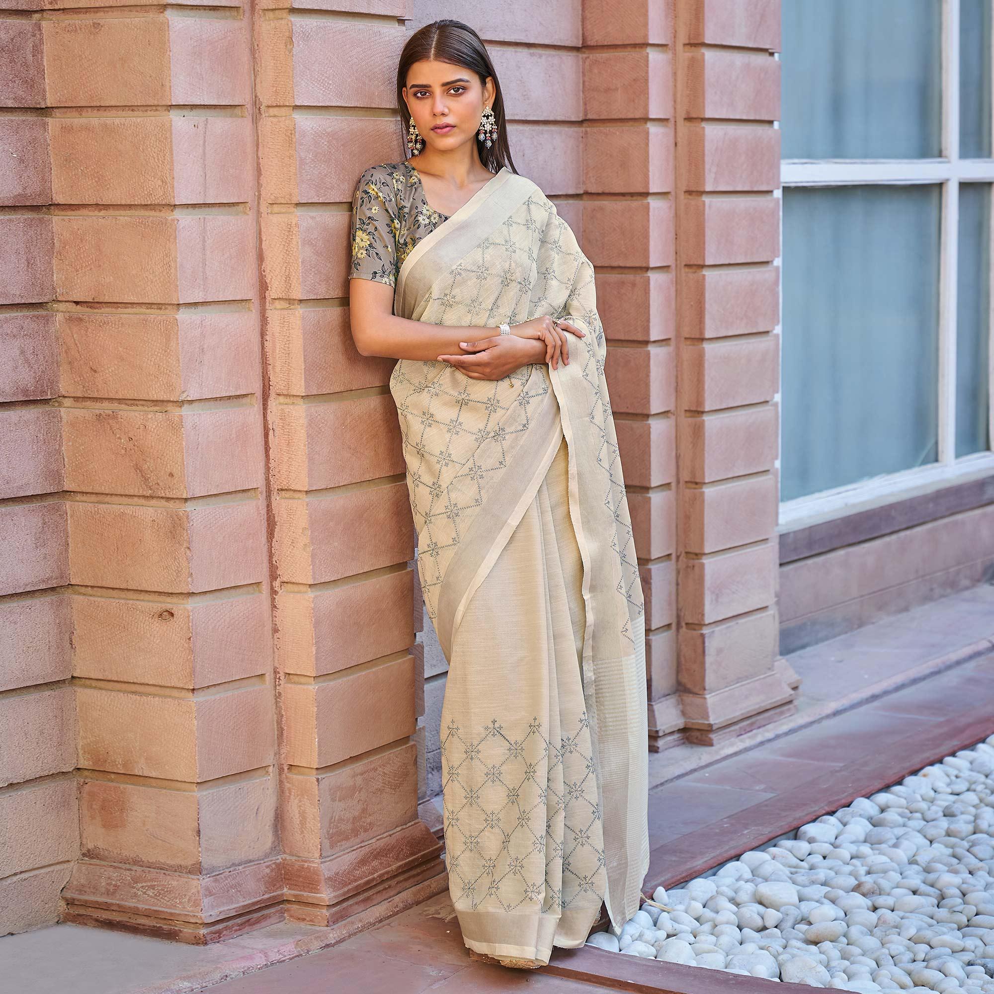 Beige Casual Wear Embroidered Linen Saree - Peachmode