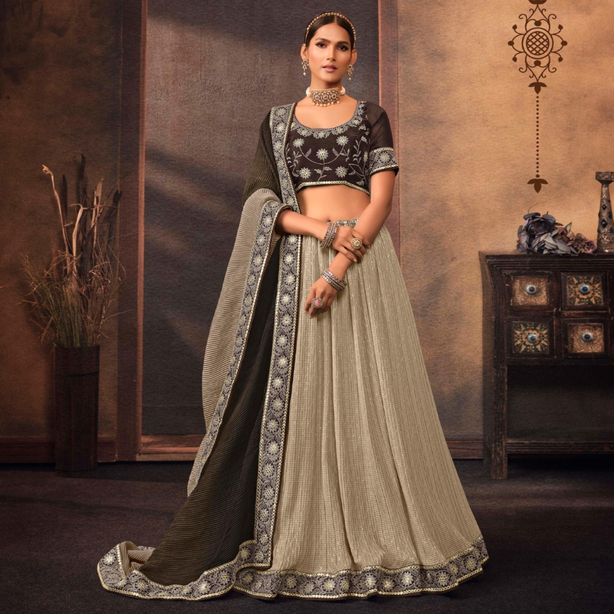 Beige Embroidered Chiffon Lehenga Choli - Peachmode