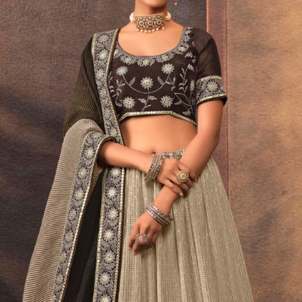 Beige Embroidered Chiffon Lehenga Choli - Peachmode