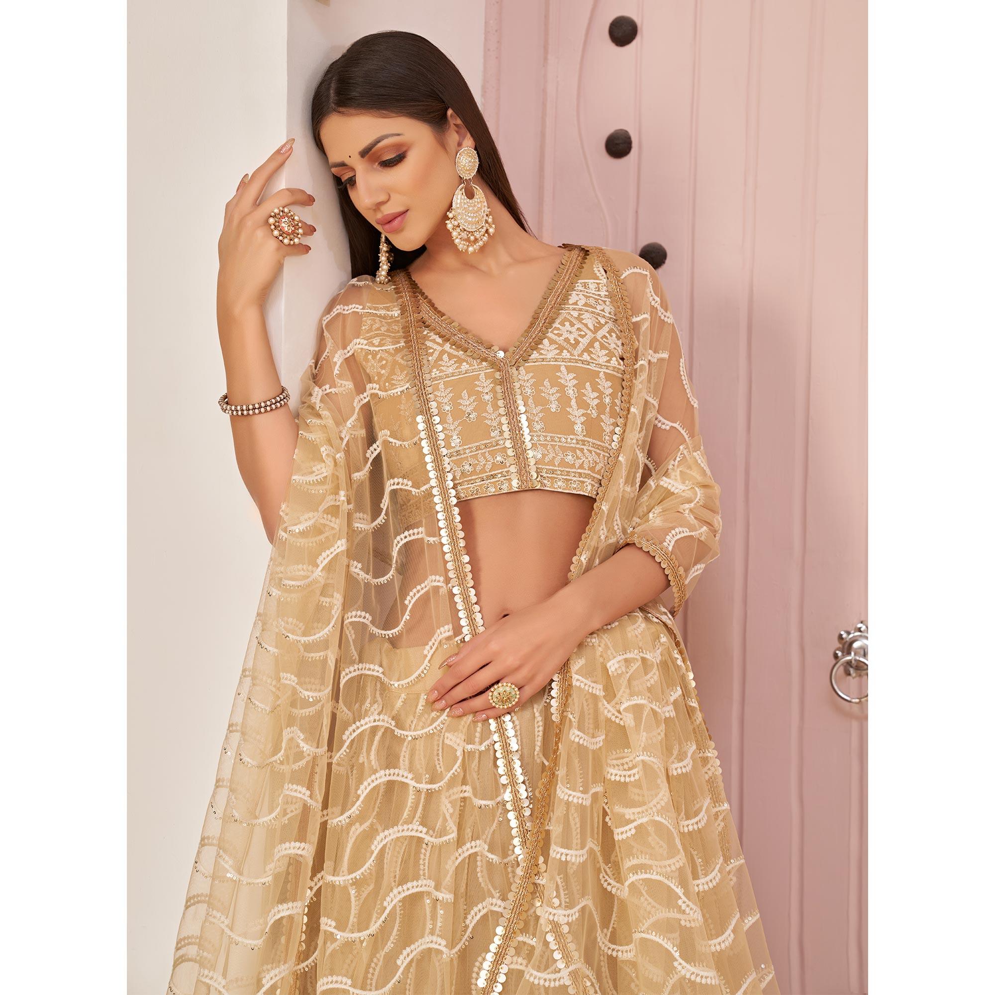 Beige Festive Wear Embroidered Mono Net Lehenga Choli - Peachmode