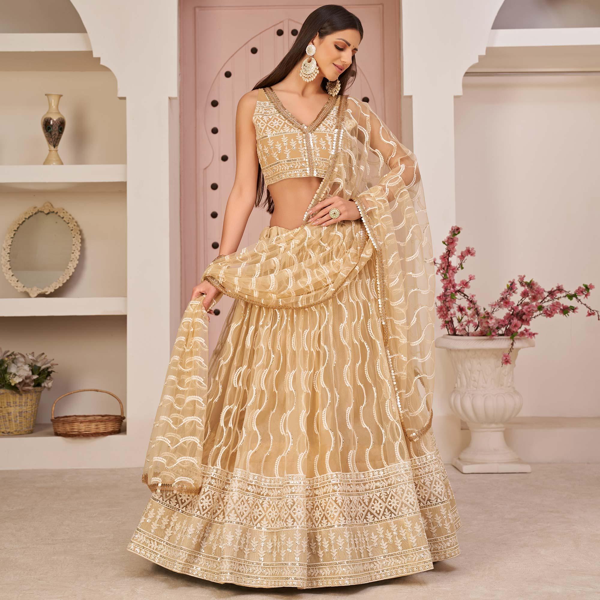 Beige Festive Wear Embroidered Mono Net Lehenga Choli - Peachmode