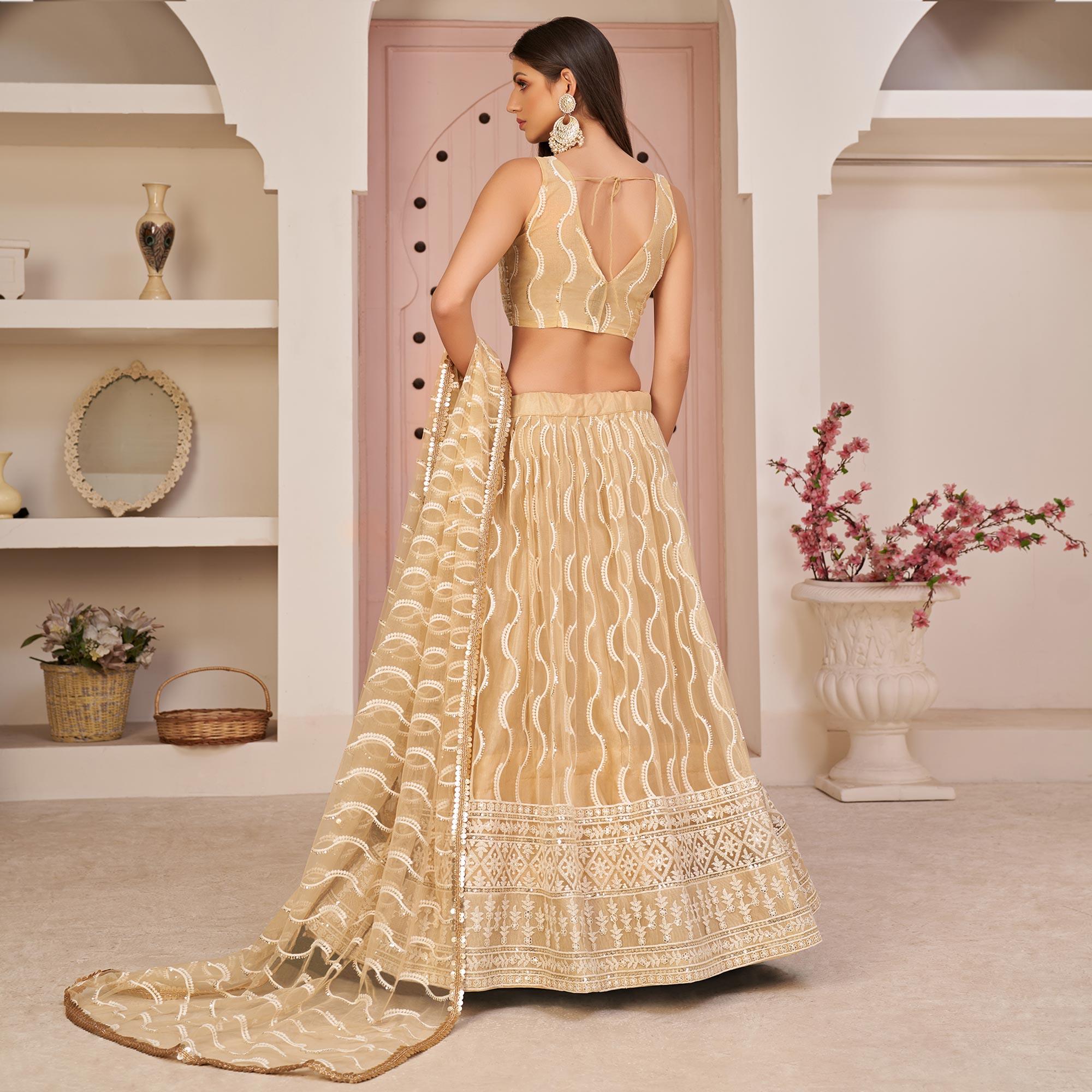 Beige Festive Wear Embroidered Mono Net Lehenga Choli - Peachmode