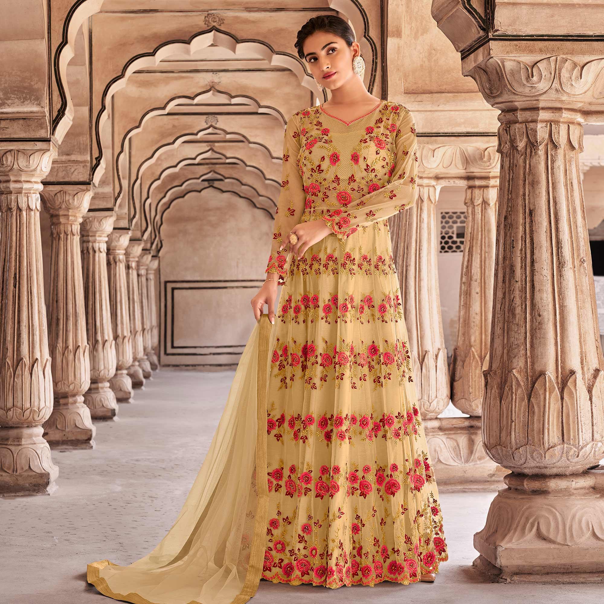 Beige Partywear Embroidered & Swarovski Work Soft Net Gown - Peachmode