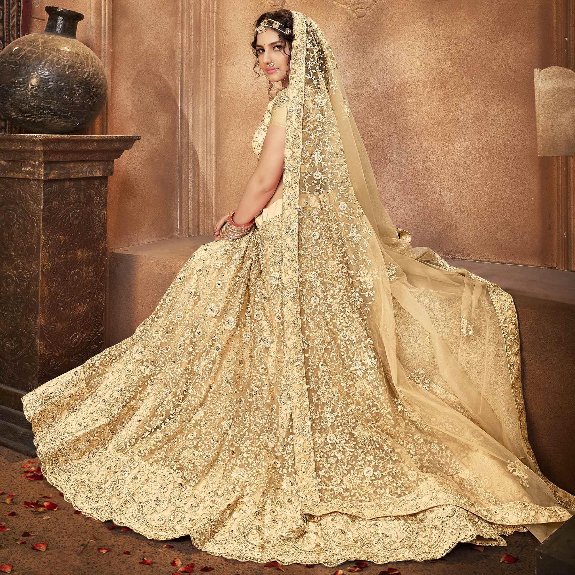 Beige Partywear Multi Sequence Embroidered Net Lehenga Choli - Peachmode