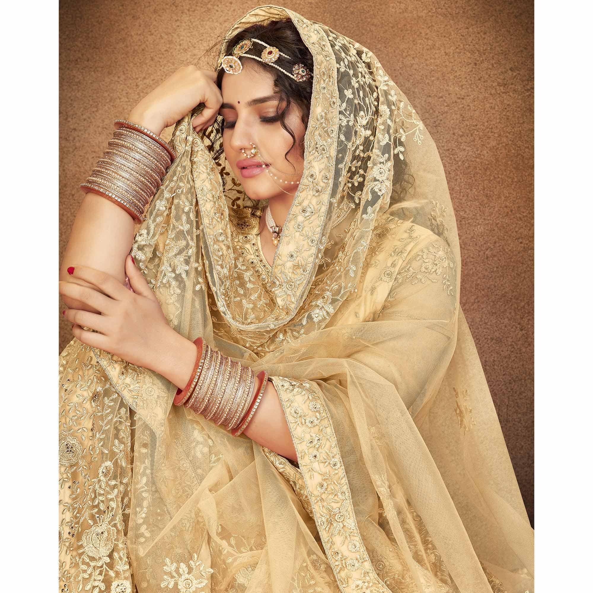 Beige Partywear Multi Sequence Embroidered Net Lehenga Choli - Peachmode