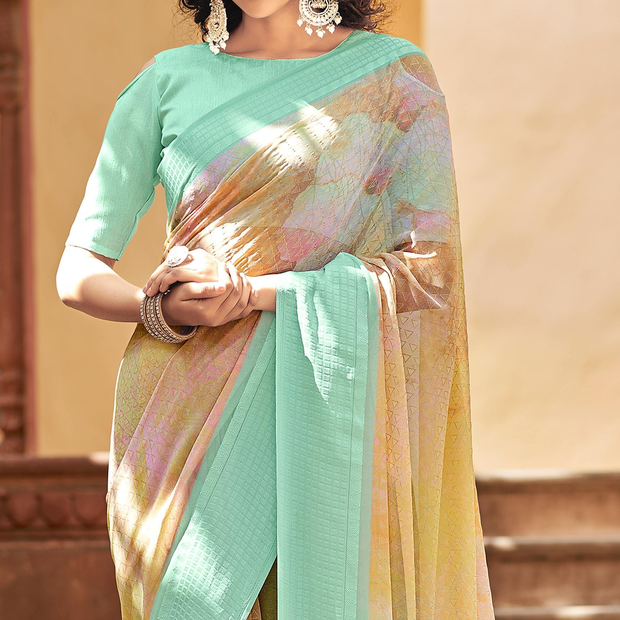 Beige Printed Georgette Saree With Tassels - Peachmode