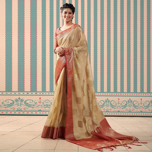 Beige Woven Linen Saree With Tassels - Peachmode