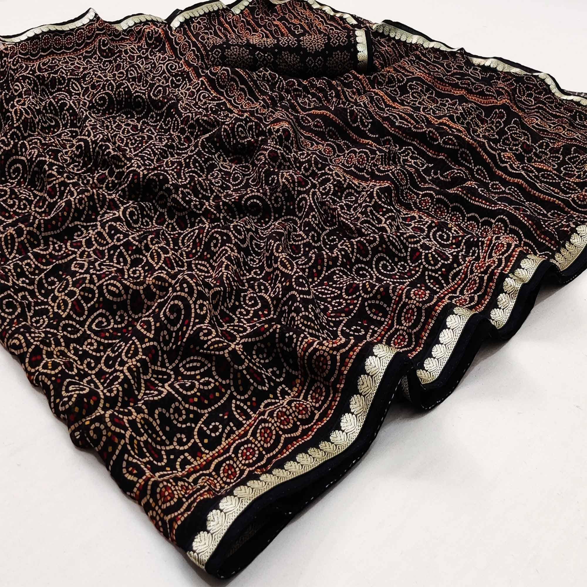 Black Casual Wear Bandhani Printed Soft Georgette Saree With Fancy Border - Peachmode