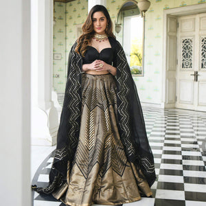 Black-Gold Partywear Woven Zari Banarasi Jacquard Lehenga Choli - Peachmode