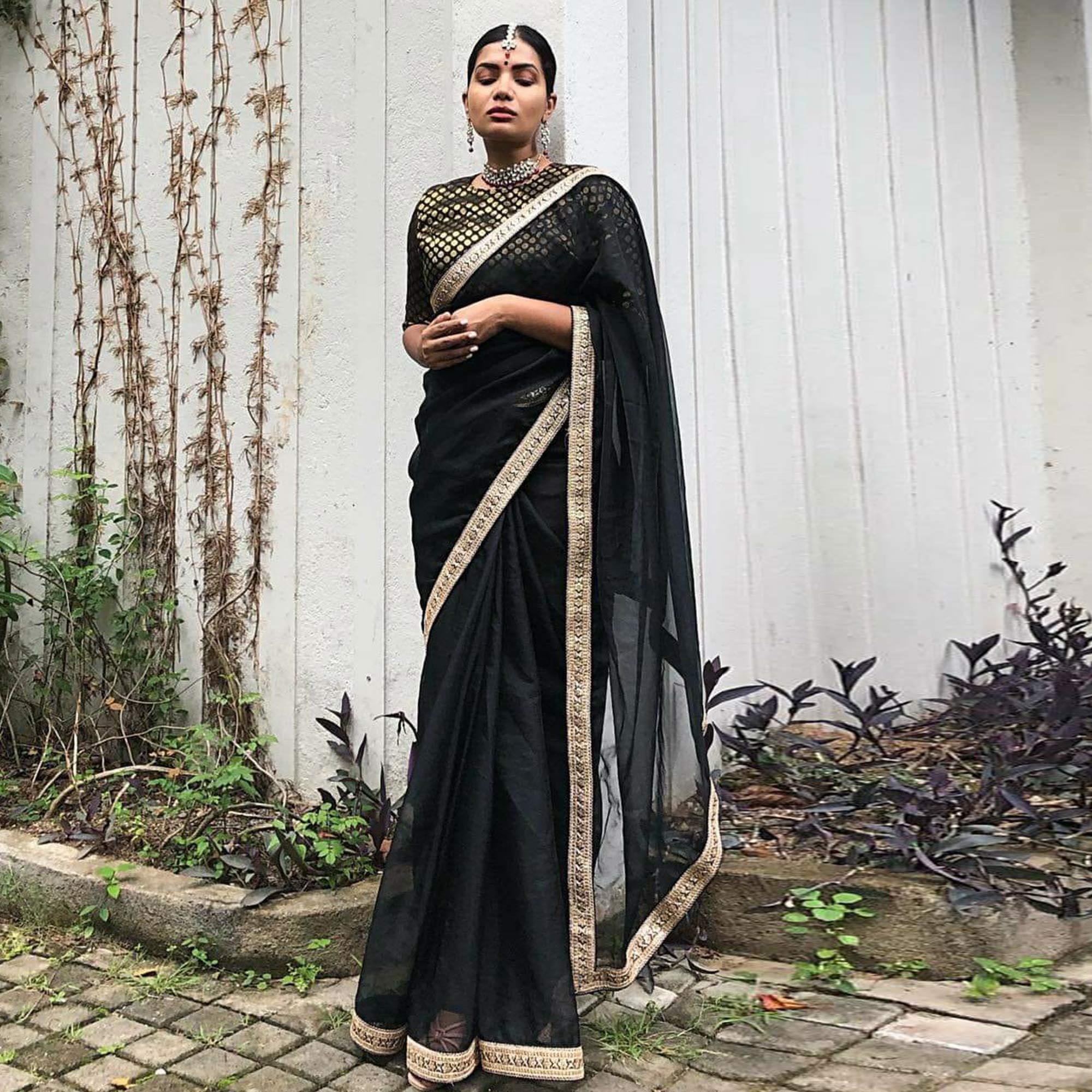 Black Partywear Sequence Embroidered Georgette Saree - Peachmode