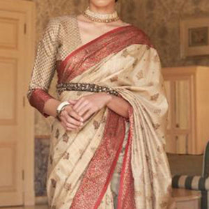 Blissful Cream Colored Festive Wear Woven Silk Saree - Peachmode