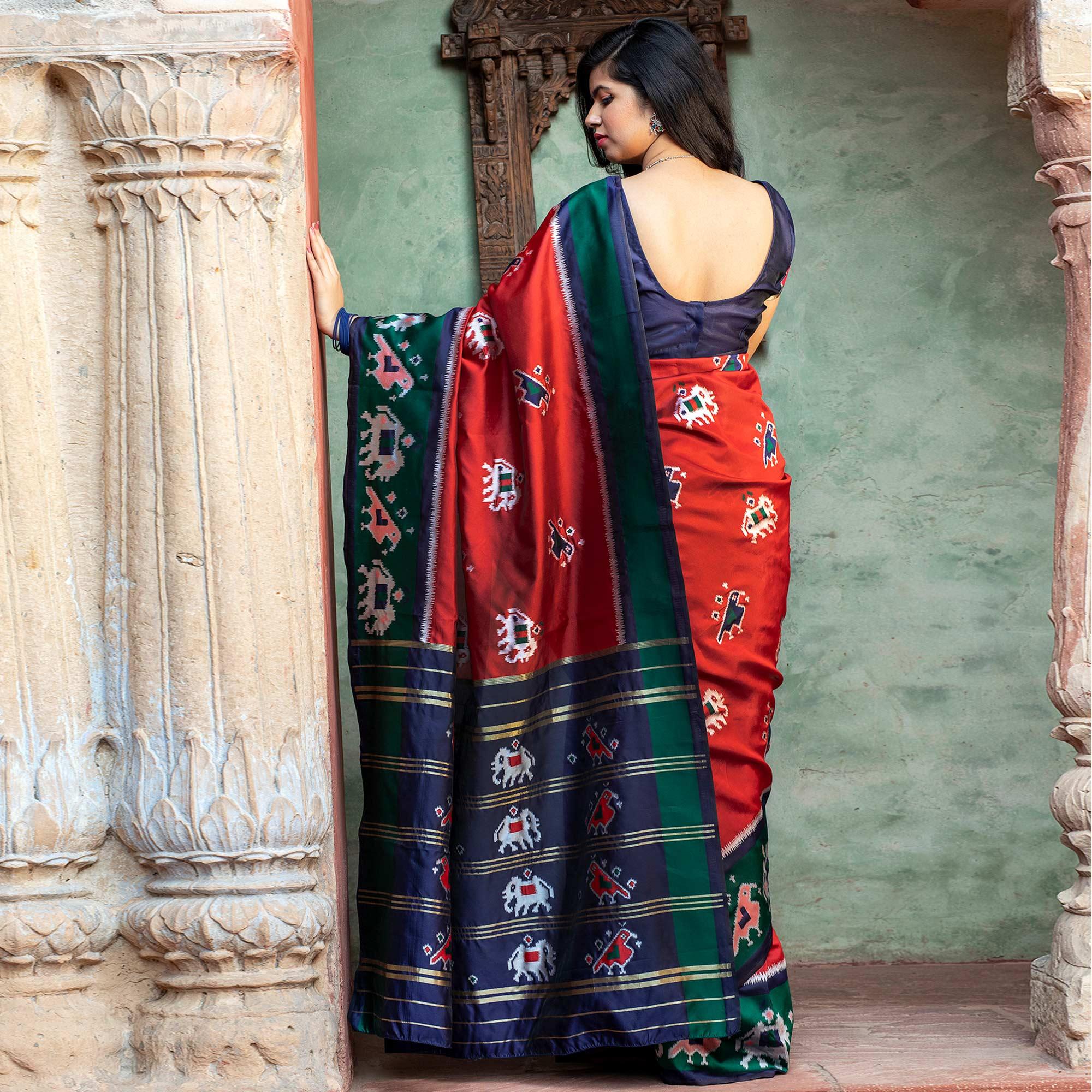 Blissful Red Colored Festive Wear Woven Patola Silk Saree - Peachmode