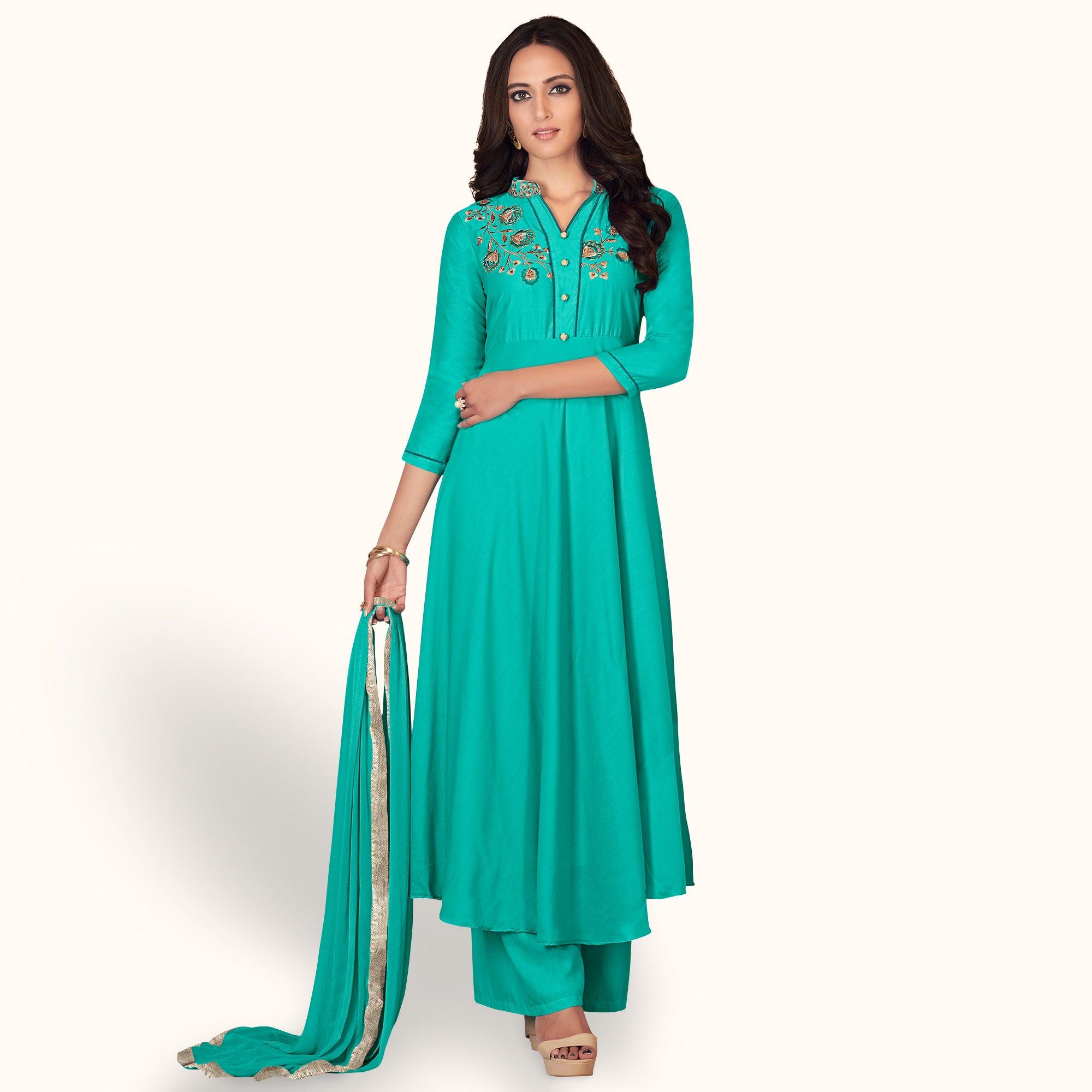 Blissful Turquoise Colored Partywear Embroidered Cotton Palazzo Suit - Peachmode