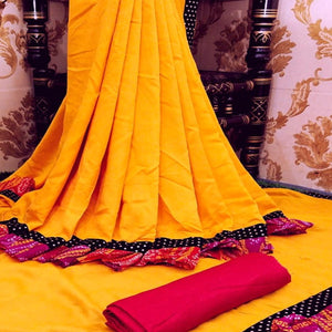 Blooming Mustard Colored Partywear Solid Vichitra Silk Saree With Bandhani Print Ruffle - Peachmode