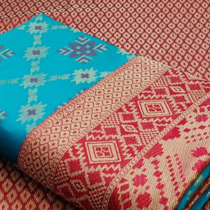 Blooming Turquoise Blue Colored Festive Wear Woven Patola Silk Saree - Peachmode