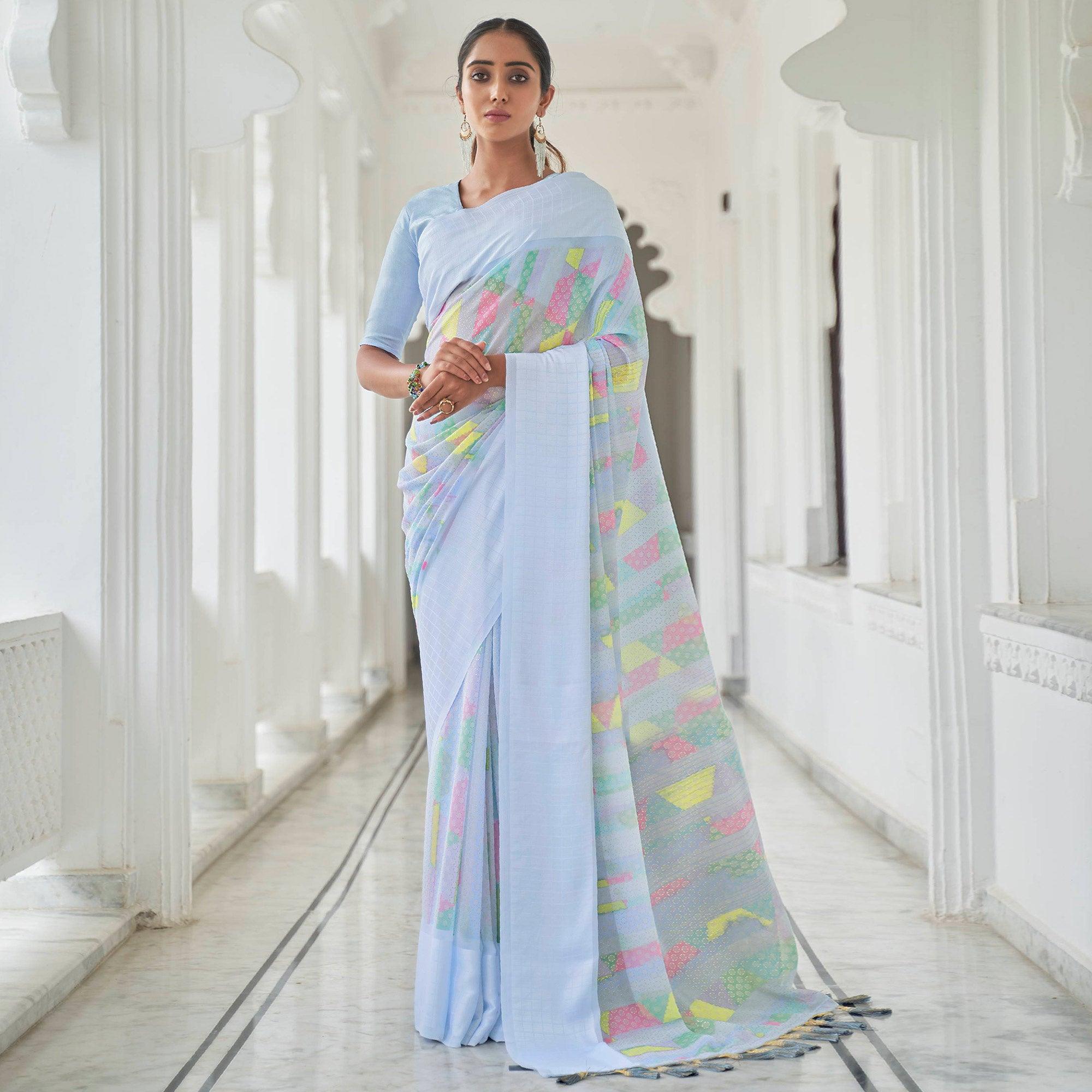 Blue Casual Wear Foil Printed Georgette Saree With Jacquard Border - Peachmode