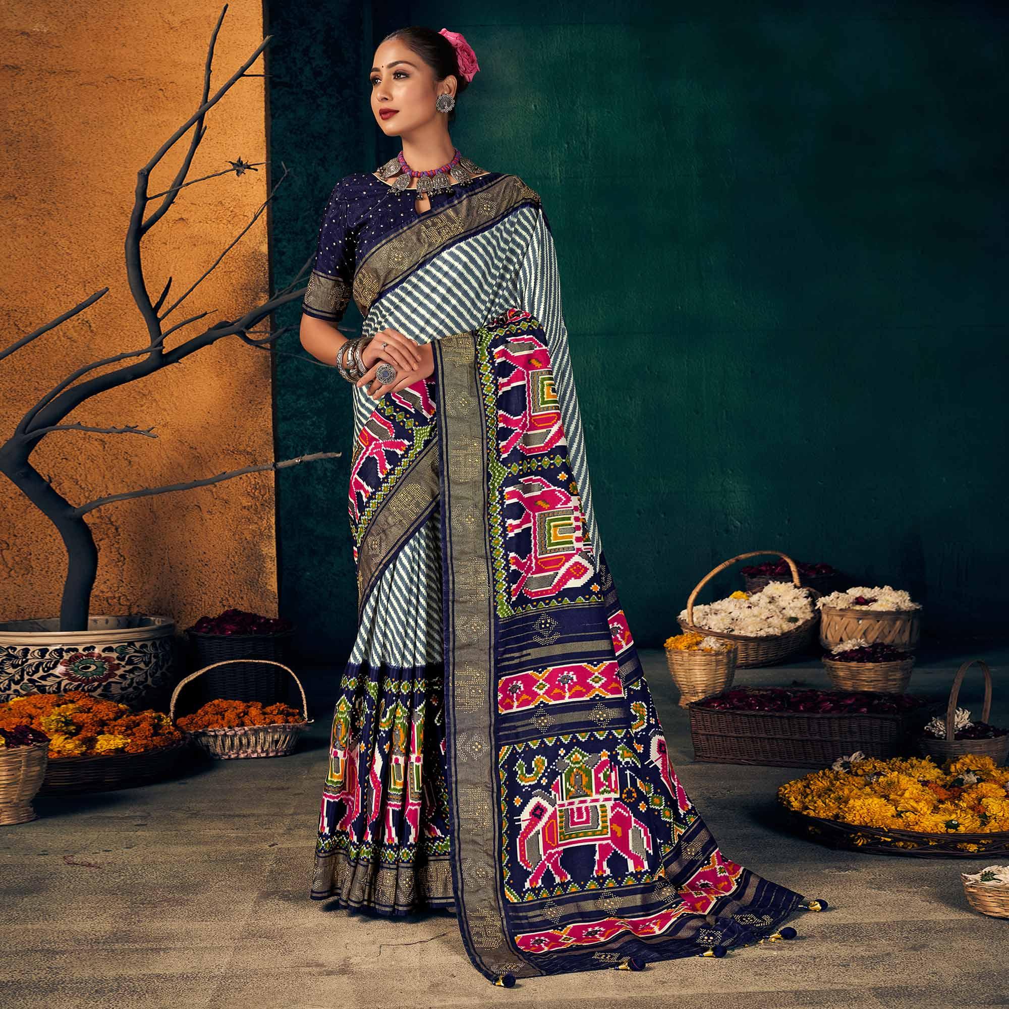 Blue Festive Wear Striped Printed With Foil Border Dola Silk Saree - Peachmode