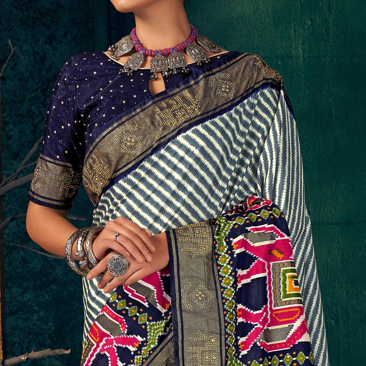 Blue Festive Wear Striped Printed With Foil Border Dola Silk Saree - Peachmode