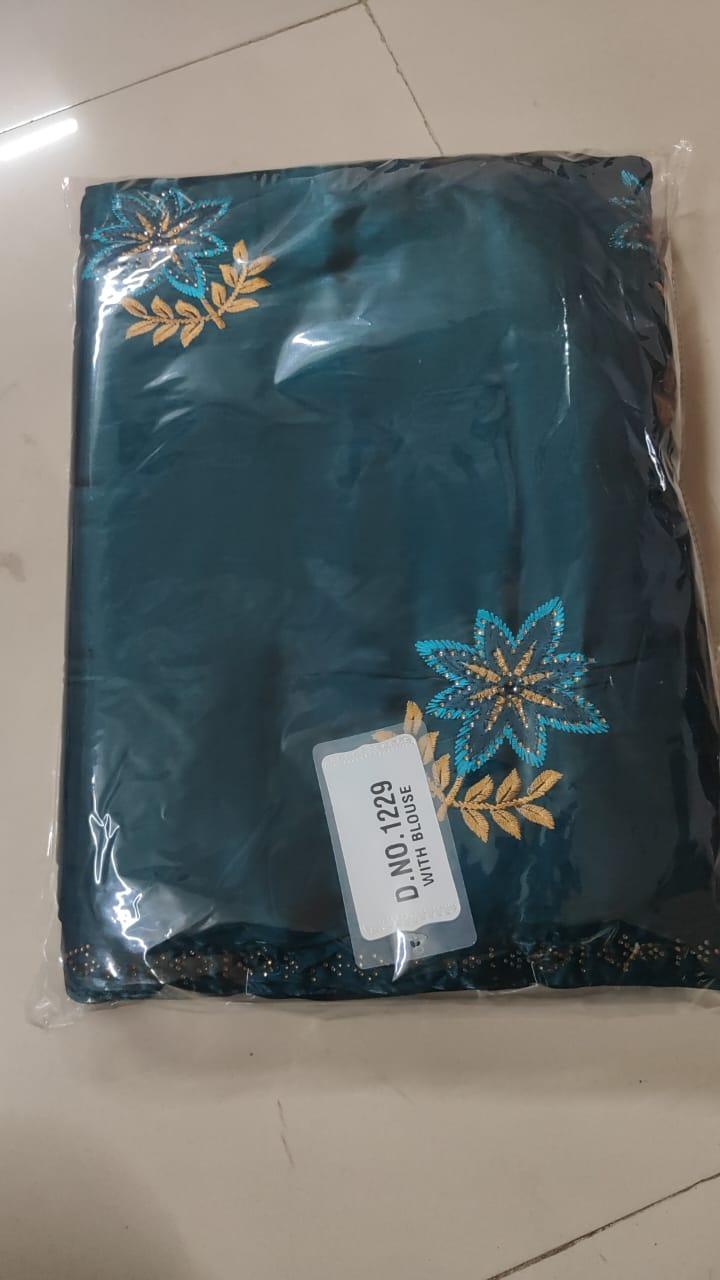 Blue Floral Embroidered With Embellished Georgette Saree - Peachmode
