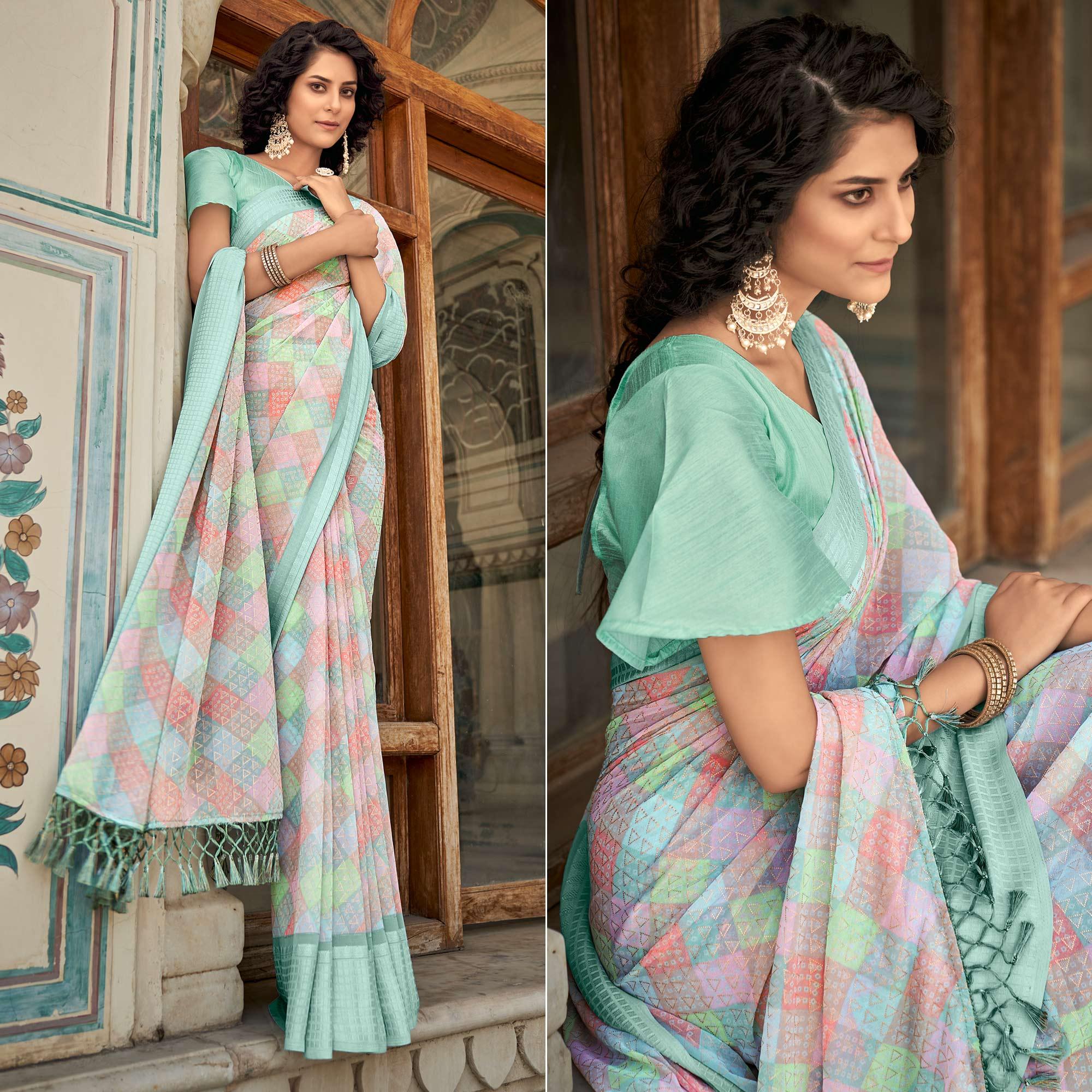 Blue Printed Georgette Saree With Tassels - Peachmode