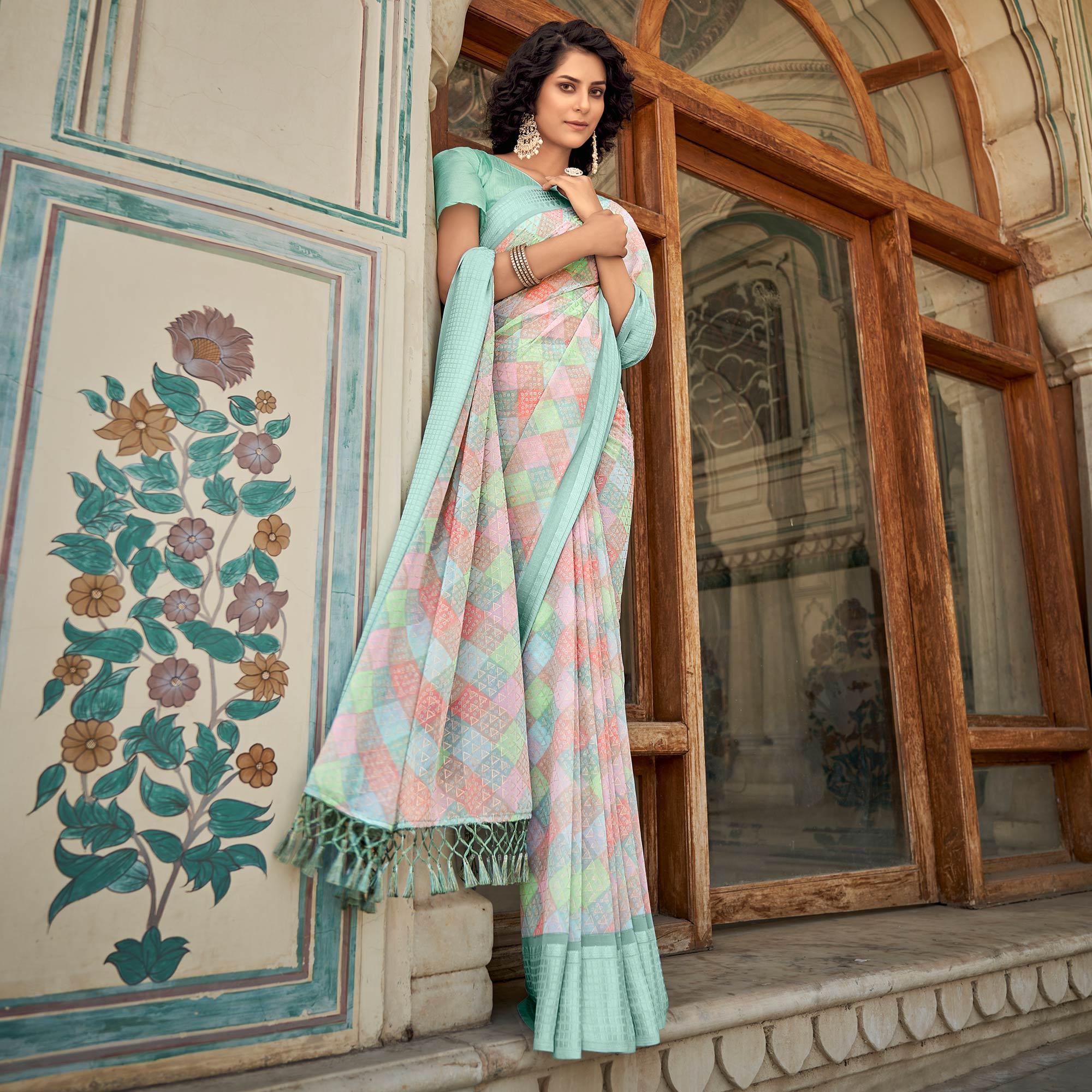 Blue Printed Georgette Saree With Tassels - Peachmode
