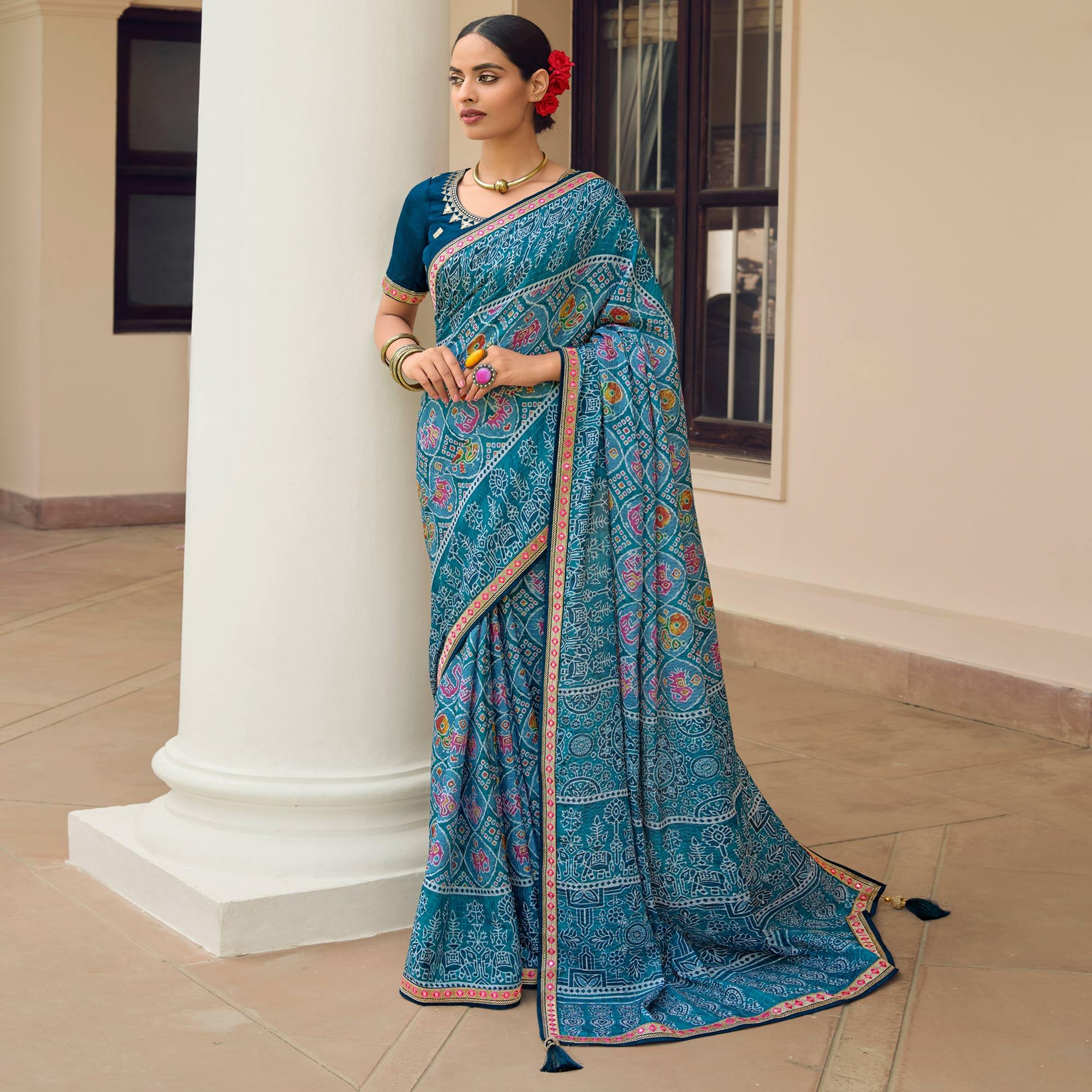 Blue Printed With Embellished Chiffon Saree With Tassels - Peachmode