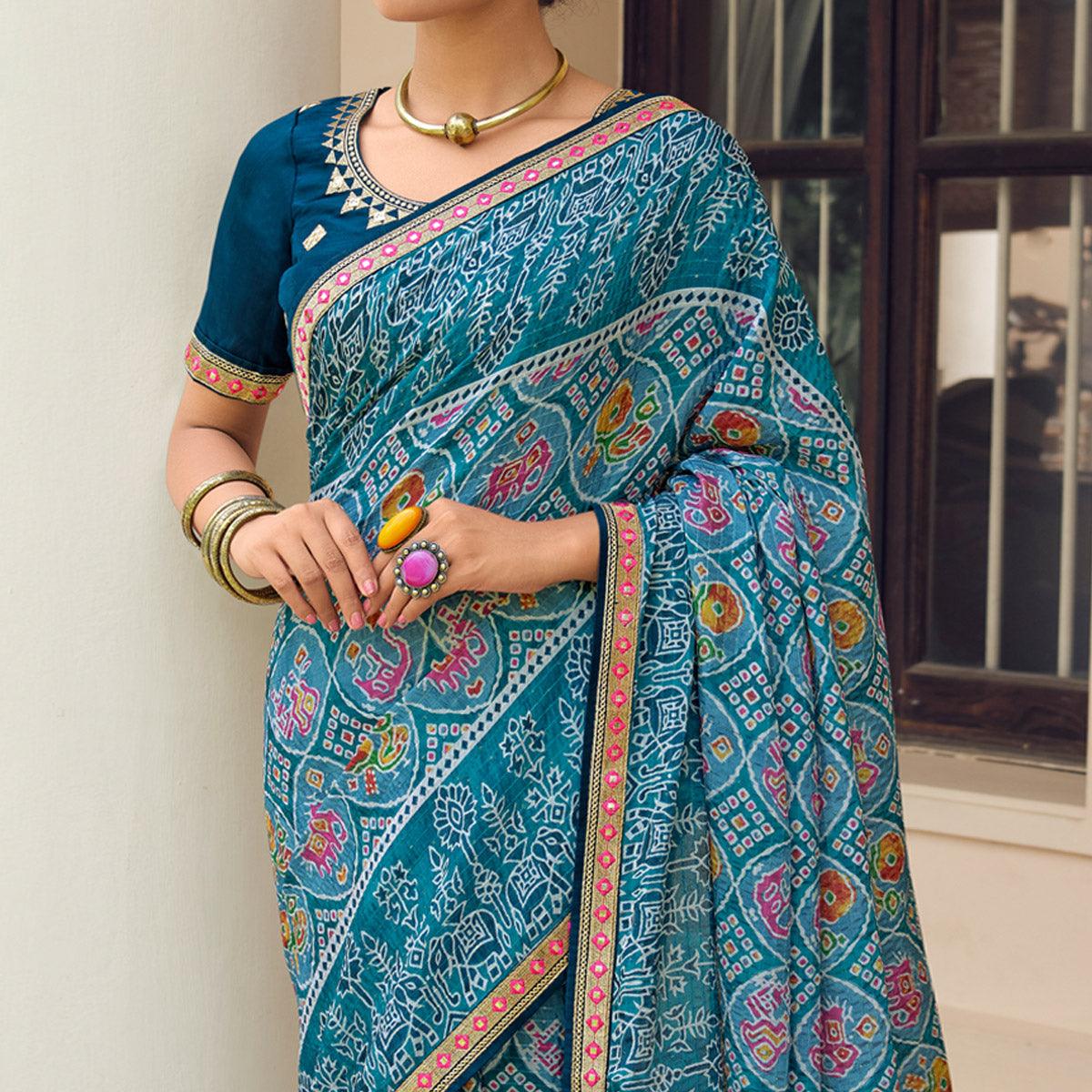 Blue Printed With Embellished Chiffon Saree With Tassels - Peachmode