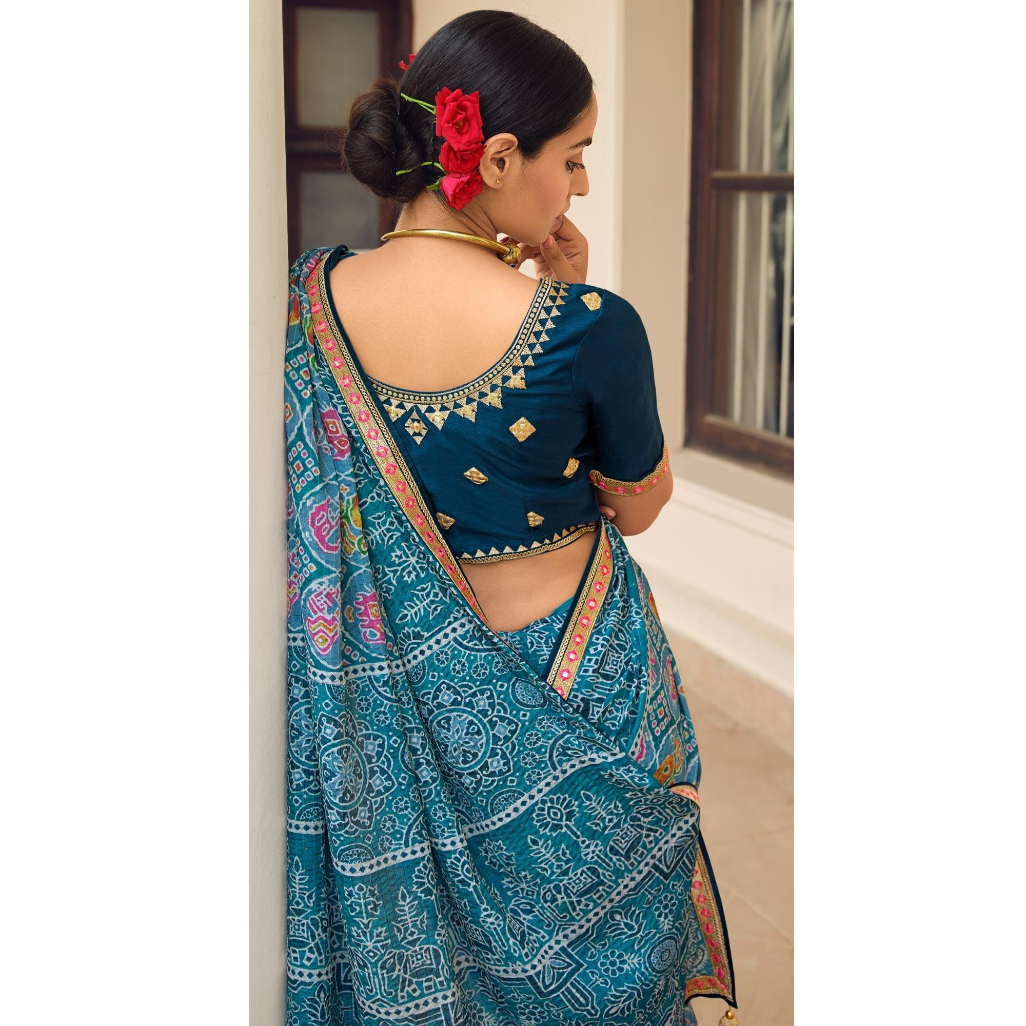 Blue Printed With Embellished Chiffon Saree With Tassels - Peachmode
