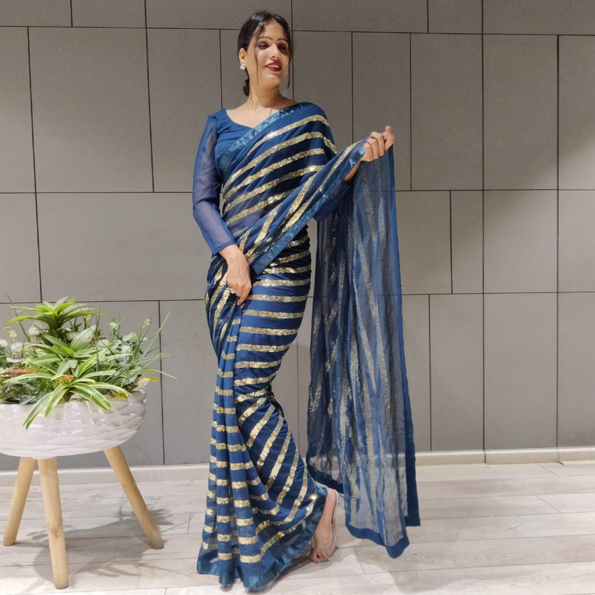 Blue Sequence Embroidered With Stripes Georgette Saree - Peachmode