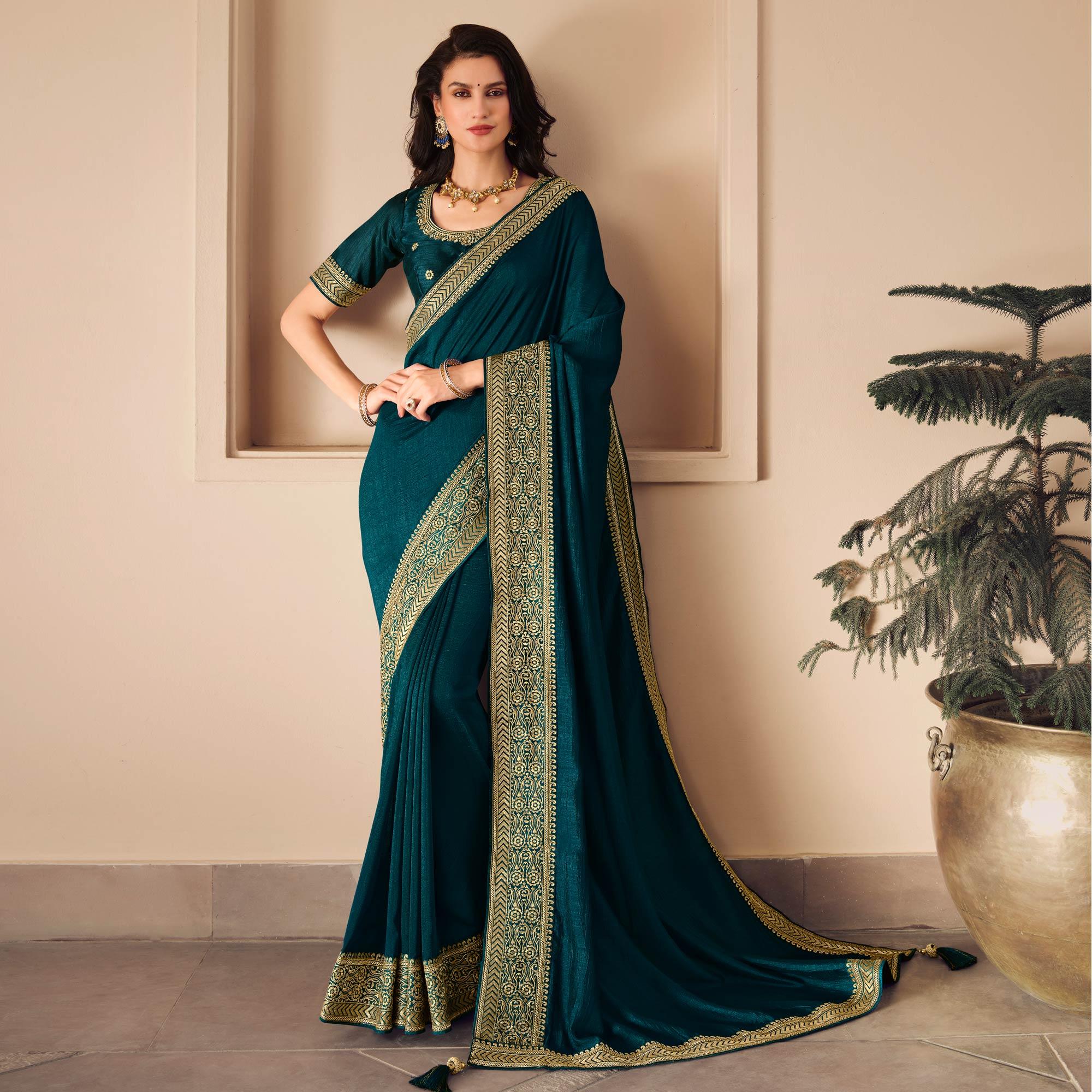 Blue Solid Vichitra Silk Saree With Tassels - Peachmode