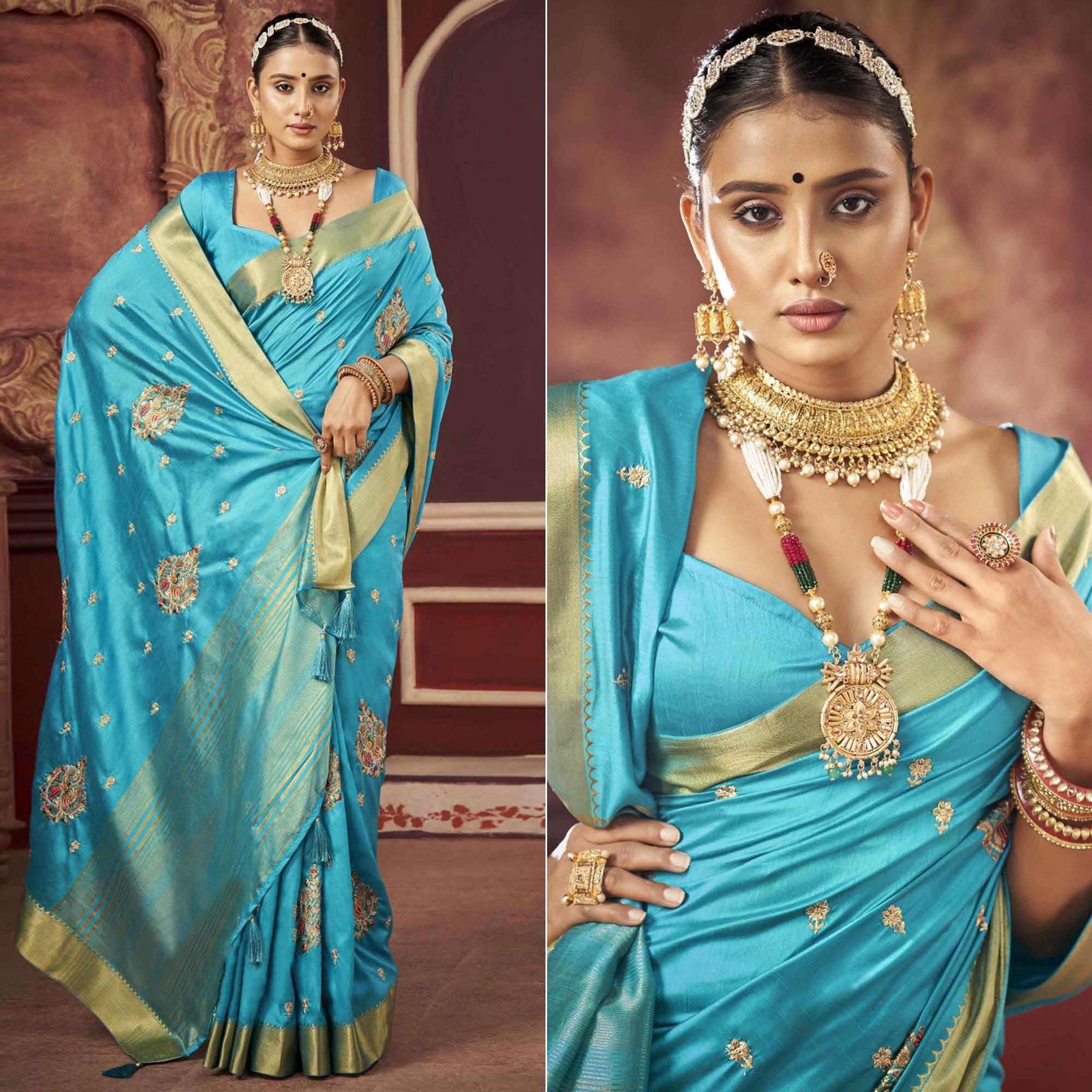 Blue Woven-Embroidered Raw Silk Saree With Tassels - Peachmode