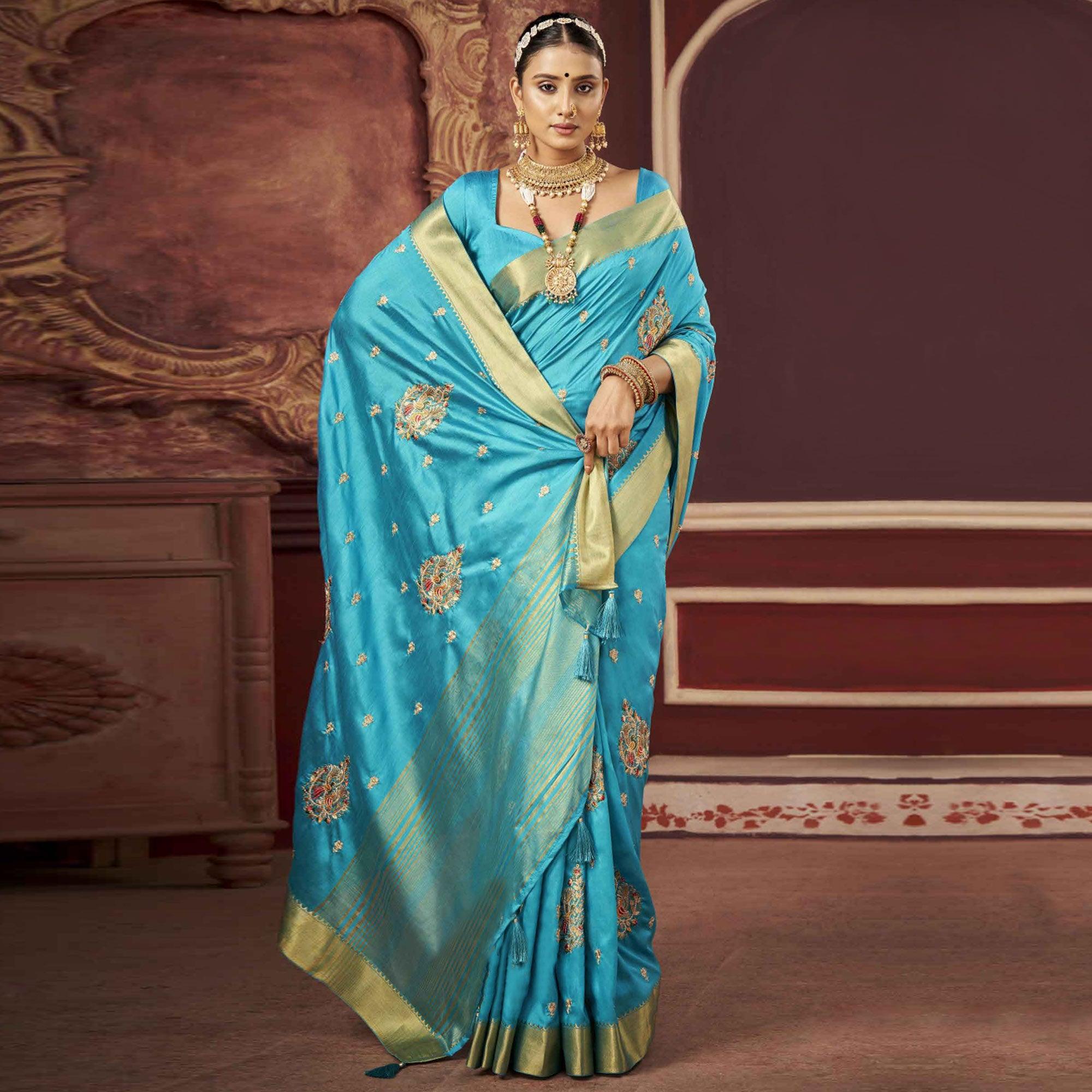 Blue Woven-Embroidered Raw Silk Saree With Tassels - Peachmode