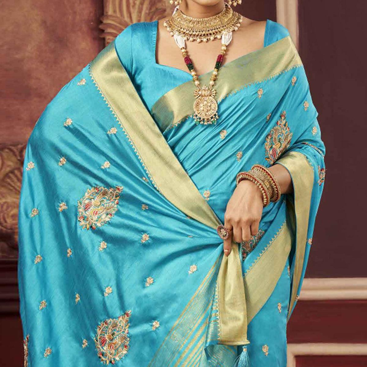 Blue Woven-Embroidered Raw Silk Saree With Tassels - Peachmode