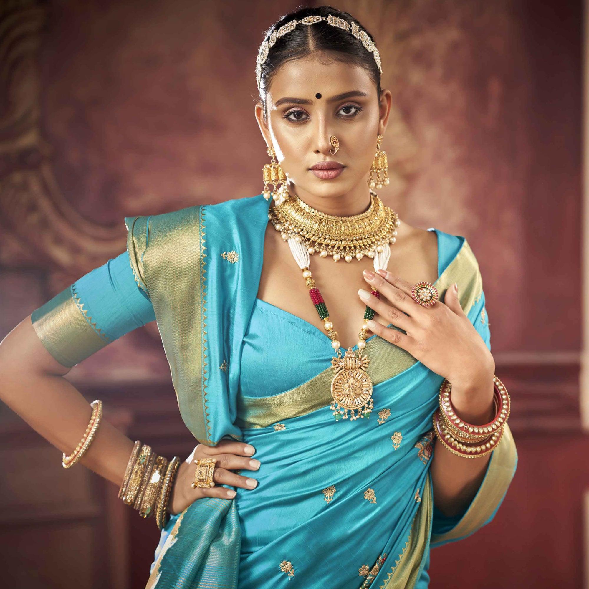 Blue Woven-Embroidered Raw Silk Saree With Tassels - Peachmode