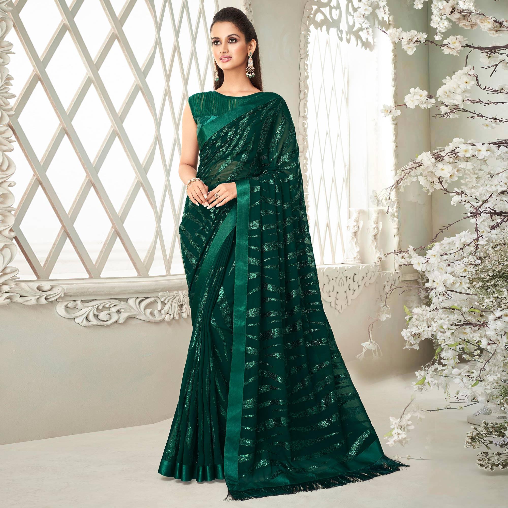 Bottle Green Sequence Embroidered Georgette Saree With Tassels - Peachmode