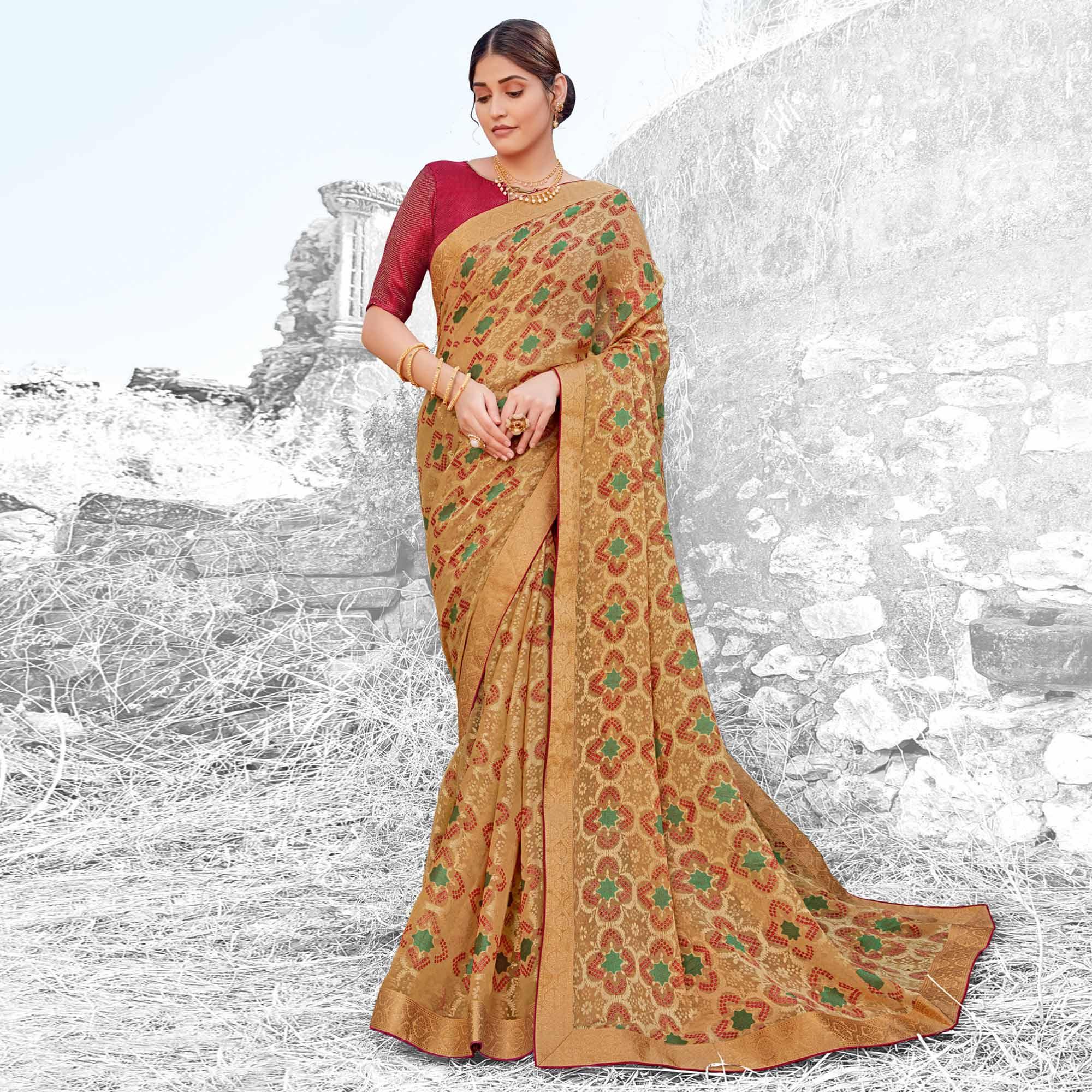 Breathtaking Chikoo Coloured Partywear Printed Brasso Saree - Peachmode