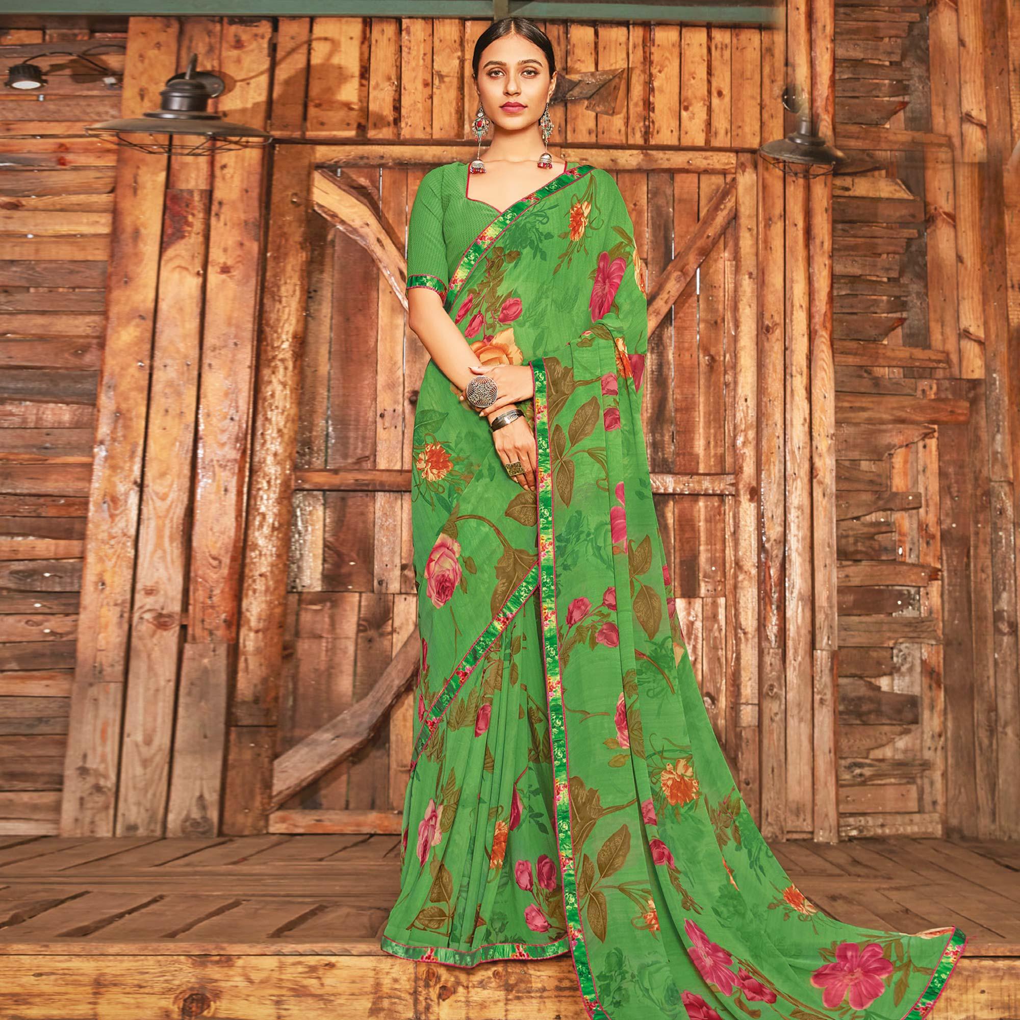 Breathtaking Green Coloured Partywear Pure Georgette Floral Printed Saree With Fancy Lace Border - Peachmode