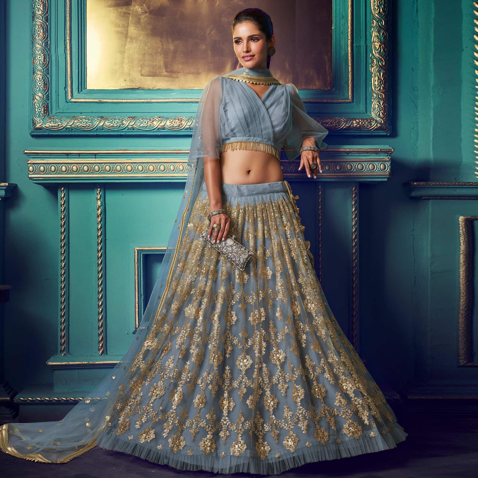 Breathtaking Grey Colored Partywear Embroidered Soft Net Lehenga Choli - Peachmode