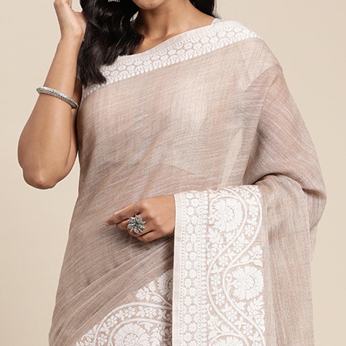 Brown Embroidered Linen Saree with Tassels - Peachmode
