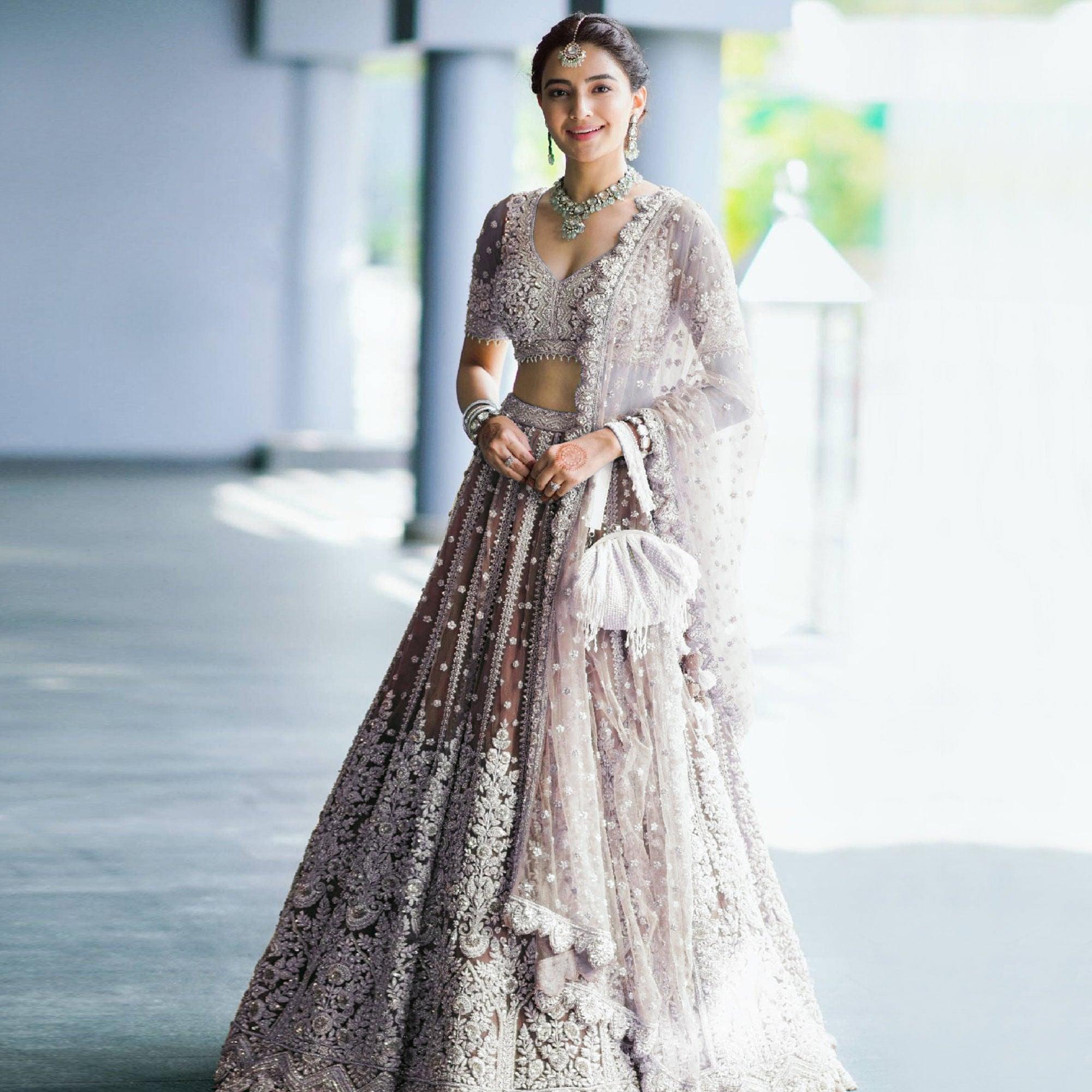 Brown Party Wear Heavy Embroidered Netted Lehenga Choli - Peachmode